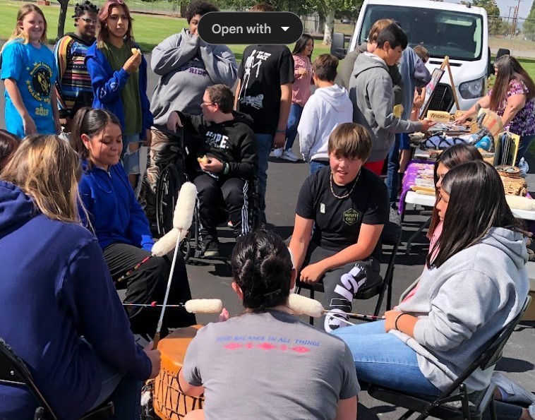 Students in a drum circle